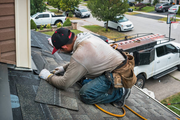 Professional Flat Roof Repair technician working in Queen, PA
